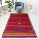 Vintage kilim rug in living room setting, bright colors, wild shaman, soft rug, bold color, Portland, Oregon, rug store, rug shop, local shop, vintage rug, modern kilim, warm colors, antique kilim rug