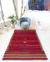 Vintage kilim rug in living room setting, bright colors, wild shaman, soft rug, bold color, Portland, Oregon, rug store, rug shop, local shop, vintage rug, modern kilim, warm colors, antique kilim rug