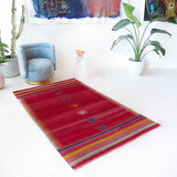 Vintage kilim rug in living room setting, bright colors, wild shaman, soft rug, bold color, Portland, Oregon, rug store, rug shop, local shop, vintage rug, modern kilim, warm colors, antique kilim rug