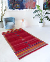 Vintage kilim rug in living room setting, bright colors, wild shaman, soft rug, bold color, Portland, Oregon, rug store, rug shop, local shop, vintage rug, modern kilim, warm colors, antique kilim rug