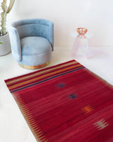 Vintage kilim rug in living room setting, bright colors, wild shaman, soft rug, bold color, Portland, Oregon, rug store, rug shop, local shop, vintage rug, modern kilim, warm colors, antique kilim rug