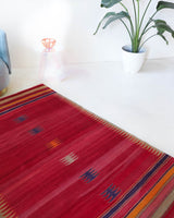 Vintage kilim rug in living room setting, bright colors, wild shaman, soft rug, bold color, Portland, Oregon, rug store, rug shop, local shop, vintage rug, modern kilim, warm colors, antique kilim rug