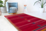 Vintage kilim rug in living room setting, bright colors, wild shaman, soft rug, bold color, Portland, Oregon, rug store, rug shop, local shop, vintage rug, modern kilim, warm colors, antique kilim rug