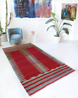 Vintage kilim rug in living room setting, bright colors, wild shaman, soft rug, bold color, Portland, Oregon, rug store, rug shop, local shop, vintage rug, modern kilim, warm colors, antique kilim rug