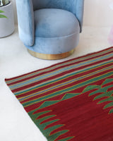 Vintage kilim rug in living room setting, bright colors, wild shaman, soft rug, bold color, Portland, Oregon, rug store, rug shop, local shop, vintage rug, modern kilim, warm colors, antique kilim rug