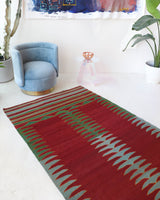 Vintage kilim rug in living room setting, bright colors, wild shaman, soft rug, bold color, Portland, Oregon, rug store, rug shop, local shop, vintage rug, modern kilim, warm colors, antique kilim rug