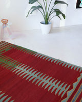 Vintage kilim rug in living room setting, bright colors, wild shaman, soft rug, bold color, Portland, Oregon, rug store, rug shop, local shop, vintage rug, modern kilim, warm colors, antique kilim rug