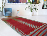 Vintage kilim rug in living room setting, bright colors, wild shaman, soft rug, bold color, Portland, Oregon, rug store, rug shop, local shop, vintage rug, modern kilim, warm colors, antique kilim rug