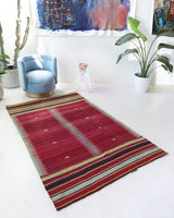 Vintage kilim rug in living room setting, bright colors, wild shaman, soft rug, bold color, Portland, Oregon, rug store, rug shop, local shop, vintage rug, modern kilim, warm colors, antique kilim rug