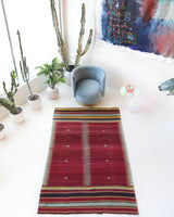 Vintage kilim rug in living room setting, bright colors, wild shaman, soft rug, bold color, Portland, Oregon, rug store, rug shop, local shop, vintage rug, modern kilim, warm colors, antique kilim rug