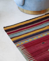 Vintage kilim rug in living room setting, bright colors, wild shaman, soft rug, bold color, Portland, Oregon, rug store, rug shop, local shop, vintage rug, modern kilim, warm colors, antique kilim rug
