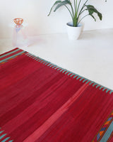 Vintage kilim rug in living room setting, bright colors, wild shaman, soft rug, bold color, Portland, Oregon, rug store, rug shop, local shop, vintage rug, modern kilim, warm colors, antique kilim rug