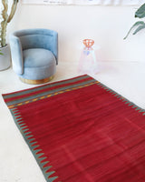 Vintage kilim rug in living room setting, bright colors, wild shaman, soft rug, bold color, Portland, Oregon, rug store, rug shop, local shop, vintage rug, modern kilim, warm colors, antique kilim rug