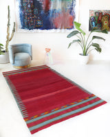 Vintage kilim rug in living room setting, bright colors, wild shaman, soft rug, bold color, Portland, Oregon, rug store, rug shop, local shop, vintage rug, modern kilim, warm colors, antique kilim rug