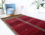 Vintage kilim rug in living room setting, bright colors, wild shaman, soft rug, bold color, Portland, Oregon, rug store, rug shop, local shop, vintage rug, modern kilim, warm colors, antique kilim rug