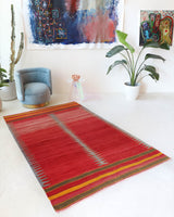 Vintage kilim rug in living room setting, bright colors, wild shaman, soft rug, bold color, Portland, Oregon, rug store, rug shop, local shop, vintage rug, modern kilim, warm colors, antique kilim rug