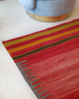 Vintage kilim rug in living room setting, bright colors, wild shaman, soft rug, bold color, Portland, Oregon, rug store, rug shop, local shop, vintage rug, modern kilim, warm colors, antique kilim rug