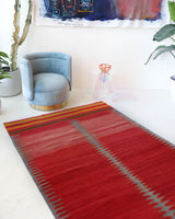 Vintage kilim rug in living room setting, bright colors, wild shaman, soft rug, bold color, Portland, Oregon, rug store, rug shop, local shop, vintage rug, modern kilim, warm colors, antique kilim rug
