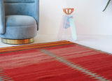 Vintage kilim rug in living room setting, bright colors, wild shaman, soft rug, bold color, Portland, Oregon, rug store, rug shop, local shop, vintage rug, modern kilim, warm colors, antique kilim rug