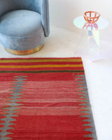 Vintage kilim rug in living room setting, bright colors, wild shaman, soft rug, bold color, Portland, Oregon, rug store, rug shop, local shop, vintage rug, modern kilim, warm colors, antique kilim rug