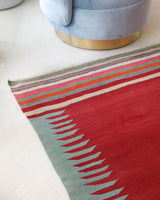 Vintage kilim rug in living room setting, bright colors, wild shaman, soft rug, bold color, Portland, Oregon, rug store, rug shop, local shop, vintage rug, modern kilim, warm colors, antique kilim rug