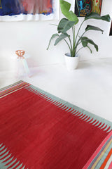 Vintage kilim rug in living room setting, bright colors, wild shaman, soft rug, bold color, Portland, Oregon, rug store, rug shop, local shop, vintage rug, modern kilim, warm colors, antique kilim rug