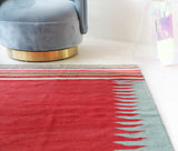 Vintage kilim rug in living room setting, bright colors, wild shaman, soft rug, bold color, Portland, Oregon, rug store, rug shop, local shop, vintage rug, modern kilim, warm colors, antique kilim rug