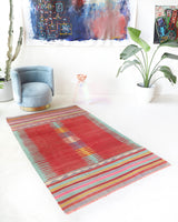 Vintage kilim rug in living room setting, bright colors, wild shaman, soft rug, bold color, Portland, Oregon, rug store, rug shop, local shop, vintage rug, modern kilim, warm colors, antique kilim rug