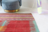 Vintage kilim rug in living room setting, bright colors, wild shaman, soft rug, bold color, Portland, Oregon, rug store, rug shop, local shop, vintage rug, modern kilim, warm colors, antique kilim rug