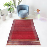 Vintage kilim rug in living room setting, bright colors, wild shaman, soft rug, bold color, Portland, Oregon, rug store, rug shop, local shop, vintage rug, modern kilim, warm colors, antique kilim rug