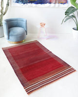 Vintage kilim rug in living room setting, bright colors, wild shaman, soft rug, bold color, Portland, Oregon, rug store, rug shop, local shop, vintage rug, modern kilim, warm colors, antique kilim rug