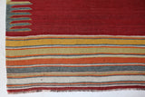 Vintage kilim rug in living room setting, bright colors, wild shaman, soft rug, bold color, Portland, Oregon, rug store, rug shop, local shop, vintage rug, modern kilim, warm colors, antique rug, antique kilim