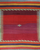 Vintage kilim rug in living room setting, bright colors, wild shaman, soft rug, bold color, Portland, Oregon, rug store, rug shop, local shop, vintage rug, modern kilim, warm colors, antique rug, antique kilim