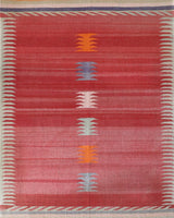 Vintage kilim rug in living room setting, old rug, antique rug, pastel colors, faded colors, Turkish rug, vintage rug, soft rug, Portland, Oregon, rug store, rug shop, local shop, earthy tones, earthy colors, warm colors