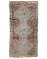 Vintage Turkish mini rug in room decor setting, old rug, antique rug, pastel colors, faded colors, Turkish rug, vintage rug, soft rug, Portland, Oregon, rug store, rug shop, local shop,  bright colors, bold colors