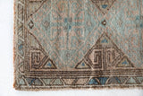 Vintage Turkish mini rug in room decor setting, old rug, antique rug, pastel colors, faded colors, Turkish rug, vintage rug, soft rug, Portland, Oregon, rug store, rug shop, local shop,  bright colors, bold colors