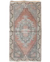 Vintage Turkish mini rug in room decor setting, old rug, antique rug, pastel colors, faded colors, Turkish rug, vintage rug, soft rug, Portland, Oregon, rug store, rug shop, local shop,  bright colors, bold colors