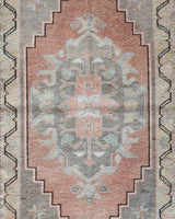 Vintage Turkish mini rug in room decor setting, old rug, antique rug, pastel colors, faded colors, Turkish rug, vintage rug, soft rug, Portland, Oregon, rug store, rug shop, local shop,  bright colors, bold colors