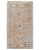 Vintage Turkish mini rug in room decor setting, old rug, antique rug, pastel colors, faded colors, Turkish rug, vintage rug, soft rug, Portland, Oregon, rug store, rug shop, local shop,  bright colors, bold colors