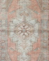 Vintage Turkish mini rug in room decor setting, old rug, antique rug, pastel colors, faded colors, Turkish rug, vintage rug, soft rug, Portland, Oregon, rug store, rug shop, local shop,  bright colors, bold colors