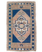 Vintage Turkish mini rug in room decor setting, old rug, antique rug, pastel colors, faded colors, Turkish rug, vintage rug, soft rug, Portland, Oregon, rug store, rug shop, local shop,  bright colors, bold colors