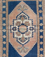 Vintage Turkish mini rug in room decor setting, old rug, antique rug, pastel colors, faded colors, Turkish rug, vintage rug, soft rug, Portland, Oregon, rug store, rug shop, local shop,  bright colors, bold colors
