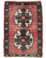 Vintage Turkish mini rug in room decor setting, old rug, antique rug, pastel colors, faded colors, Turkish rug, vintage rug, soft rug, Portland, Oregon, rug store, rug shop, local shop,  bright colors, bold colors