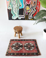 Vintage Turkish mini rug in room decor setting, old rug, antique rug, pastel colors, faded colors, Turkish rug, vintage rug, soft rug, Portland, Oregon, rug store, rug shop, local shop,  bright colors, bold colors