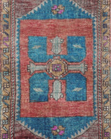 Vintage Turkish mini rug in room decor setting, old rug, antique rug, pastel colors, faded colors, Turkish rug, vintage rug, soft rug, Portland, Oregon, rug store, rug shop, local shop,  bright colors, bold colors