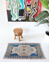 Vintage mini kilim rug in room decor setting, kilim, Turkish rug, vintage rug, portland, rug shop, bright colors, wild shaman, soft rug, bold color, Portland, Oregon, rug store, rug shop, local shop