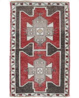 Vintage Turkish mini rug in room decor setting, old rug, antique rug, pastel colors, faded colors, Turkish rug, vintage rug, soft rug, Portland, Oregon, rug store, rug shop, local shop,  bright colors, bold colors