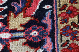 Antique Persian area rug in a living room setting, pile rug, vintage rug, portland, rug shop, bright colors, wild shaman, soft rug, bold color, Portland, Oregon, rug store, rug shop, local shop, antique rug, Persian rug, handmade rug, wool rug, distressed rug