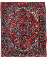Antique Persian area rug in a living room setting, pile rug, vintage rug, portland, rug shop, bright colors, wild shaman, soft rug, bold color, Portland, Oregon, rug store, rug shop, local shop, antique rug, Persian rug, handmade rug, wool rug, distressed rug