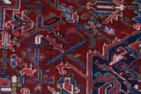 Antique Persian area rug in a living room setting, pile rug, vintage rug, portland, rug shop, bright colors, wild shaman, soft rug, bold color, Portland, Oregon, rug store, rug shop, local shop, antique rug, Persian rug, handmade rug, wool rug, distressed rug